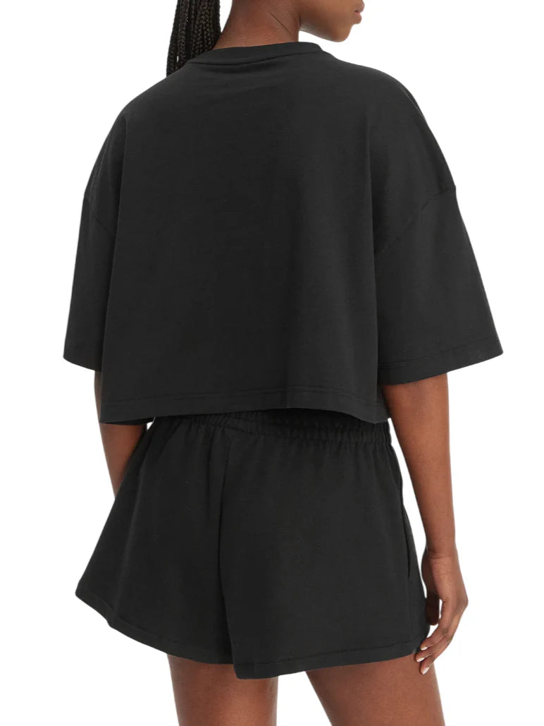 Calvin Klein Jeans T-shirt crop manica corta con logo nero LV047F828G UB1 Calvin Klein Jeans