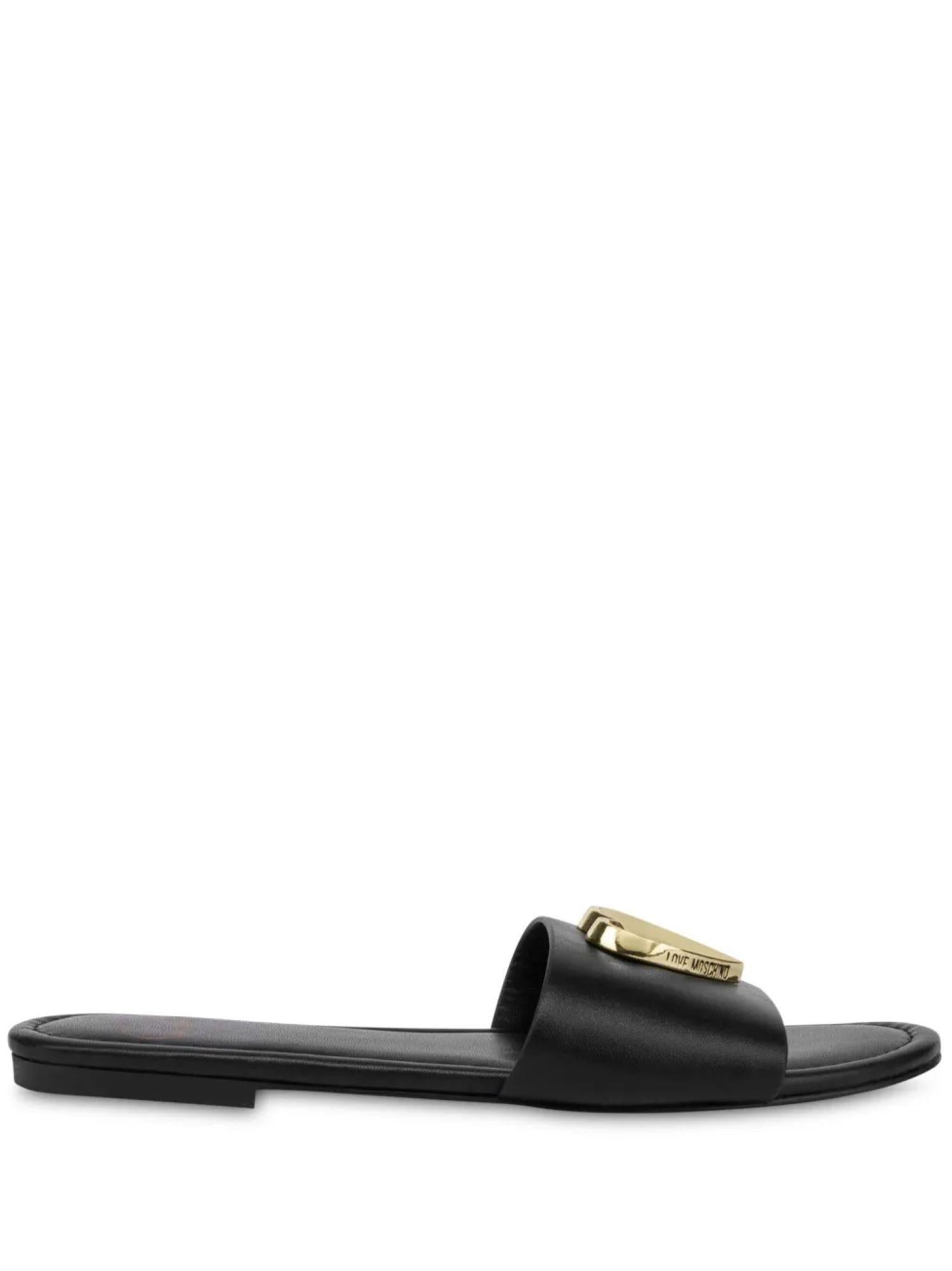 Love Moschino ciabatta bassa in pelle con placca cuore nero JA28161G0M-IA0 000 MOSCHINO LOVE 