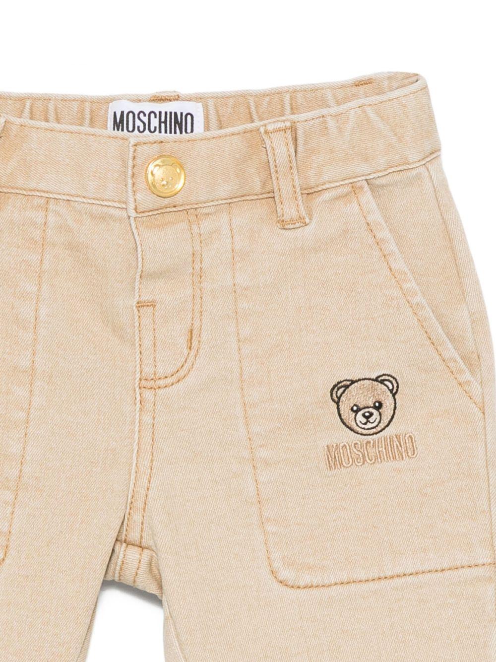 Moschino pantaloni neonato con orsetto beige MUP05L-LXE61 20404 MOSCHINO 